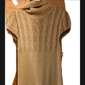 Knitted dress size L by Rabbit X3. Acrylic and 30%wool. Short sleeves.